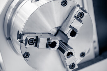 Closeup Machine robot CNC turning milling factory metal industry, toning color