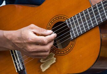 Fototapeta premium man playing acoustic guitar