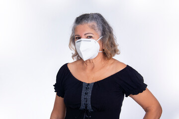 elderly woman wears protective mask covid, flu, health care, personal care, elderly in adaptation...