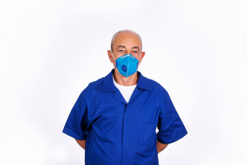 Elderly factory worker man wearing covid protective mask, on white background
