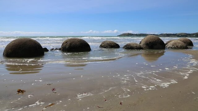 High tide is coming - Moeraki Boulders - New Zealand