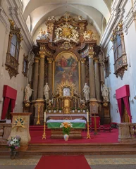 Poster VIENNA, AUSTIRA - JUNI 17, 2021: The  prebytery and main altar of baroque church  Alserkirche with the Holy Trinity painting by Joseph Ritter von Hempel (1826). © Renáta Sedmáková