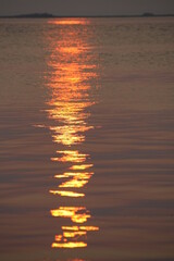 Reflection of sunset, on water, wonderful, deliberately blurred gold - Long Island - New York - USA