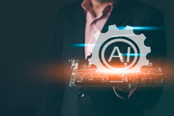 A business holding the green board with chip, computer graphic icon and light