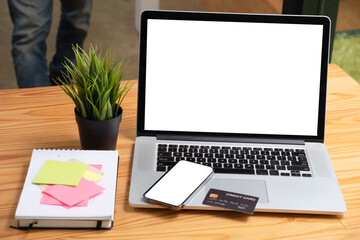 Top view of workspace with Online payments concept, Smartphone blank screen for advertisement with...