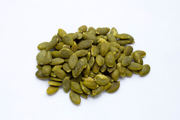 Pumpkin seeds on white background