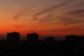 Fototapeta na wymiar orange sunset in the sky in the city