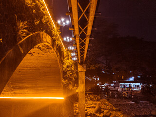 bridge at night with bright decorative lights