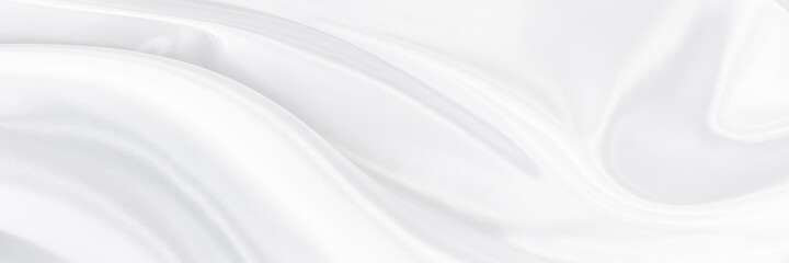 White gray satin texture that is white silver fabric silk panorama background with beautiful soft blur pattern natural.