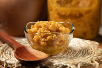 Ambrosia dulce de leche in a setting decorated with accessories that reference Minas Gerais and the...