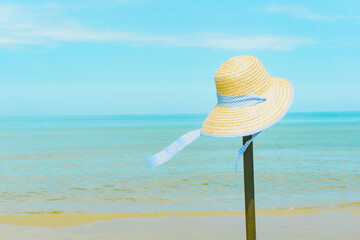 Fototapeta na wymiar Sea and straw hat. 海と麦わら帽子