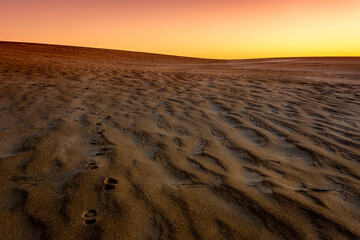 Sunset at Jockey Ridge State Park. Located in Nags Head, North Carolina. It is a tallest sand dune...