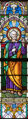 Fototapeta na wymiar VIENNA, AUSTIRA - JUNI 24, 2021: The St. Peter the Apostle on the stained glass of church St. Severin.