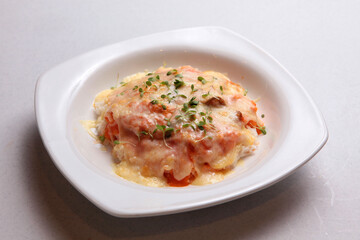baked cheese fried rice with chicken, beef, pork meat ball in white background fusion asian halal menu
