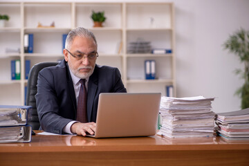 Old male employer and too much work in the office