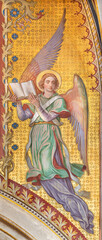 Fototapeta na wymiar VIENNA, AUSTIRA - JUNI 24, 2021: The fresco of angel with the book in the Votivkirche church by brothers Carl and Franz Jobst (sc. half of 19. cent.).