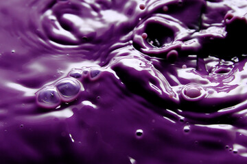 Close up of purple liquid splash