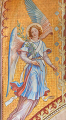 VIENNA, AUSTIRA - JUNI 24, 2021: The fresco of angel with the flower in the Votivkirche church by brothers Carl and Franz Jobst (sc. half of 19. cent.).