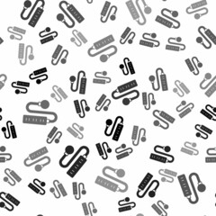 Black Electric extension cord icon isolated seamless pattern on white background. Power plug socket. Vector