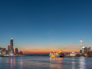 Panorama of Victoria Harbor in Hong Kong at dusk