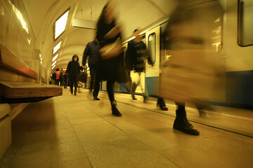 crowd of people metro in motion blurred, abstract background urban traffic people