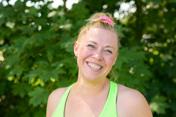 Happy vivacious woman with a beaming friendly smile