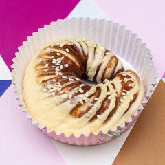 Cute bread on multicolor background.