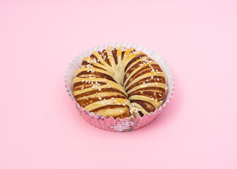 Bread on light pink background.
