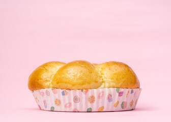 Bread on light pink background.