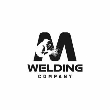 Letter M welding logo, welder silhouette working with weld helmet in simple and modern design style art