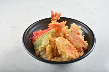 japanese deep fried tempura prawn and vegetables rice bowl in black bowl in white marble healthy poke bowl menu