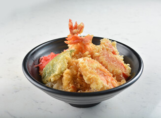 japanese deep fried tempura prawn and vegetables rice bowl in black bowl in white marble healthy poke bowl menu