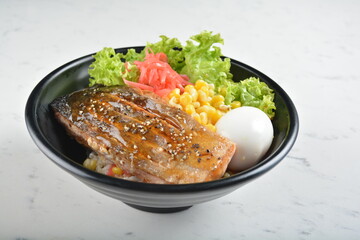 japanese bbq grill teriyaki salmon seafood with boiled egg, corn, red ginger and rice bowl with onsen egg in black bowl in white marble healthy poke bowl menu