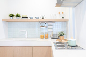 Interior of modern comfortable white kitchen.