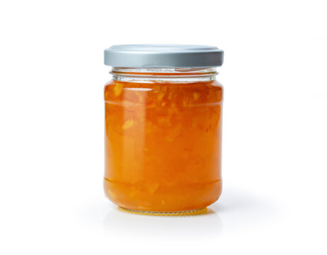 glass jar with orange jam