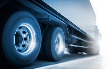 Speed Motion Blur of Semi Truck Driving on The Road. Industry Road Freight by Truck. Logistic and...