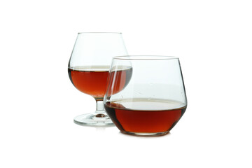Glasses of cognac isolated on white background