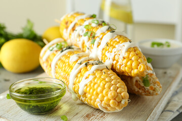 Concept of tasty food with grilled corn