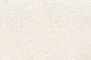 Light uniform texture of a smooth sheet of paper. The surface of the cardboard with small...