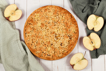 Whole traditional European apple pie with topping crumbles called 'Streusel'