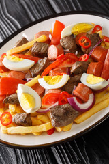 Pique macho is a very popular dish from Bolivia made of beef cuts and fried sausages with fries,...