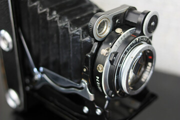 Fototapeta na wymiar Lens on an old film rangefinder camera