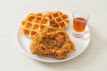 fried chicken waffle with honey or maple syrup