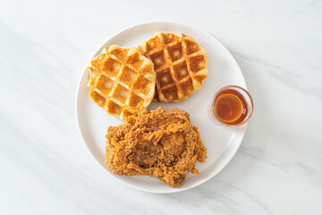 fried chicken waffle with honey or maple syrup