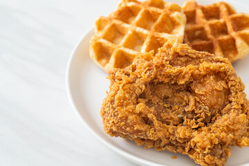 fried chicken waffle with honey or maple syrup