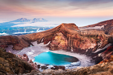 Lake in the crater of Gorely volcano in Kamchatka peninsula, Russia. Beautiful landscape at sunrise.