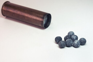 lead buckshot, large pellet, large-caliber brass casing. Cartridge case for hunting rifle