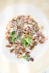 Presentation of a typical dish of Italian cuisine of mixed legume soup