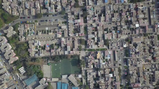 Aerial drone view from above of houses, passageways and streets Los Precursors