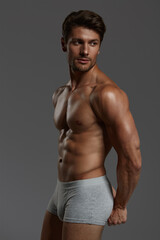 Fototapeta premium Young european man with naked sportive torso